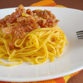 Spaghetti alla chitarra con salsiccia e pancetta