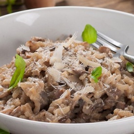 I Primi Piatti di Natale: il risotto ai funghi freschi è un primo piatto intramontabile.