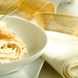 I Primi Piatti di Natale: Deliziosi Spaghetti alla Chitarra con Ricotta e Gamberoni.